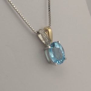 9ct White and Yellow Gold Blue Topaz and Diamond pendant and chain-0