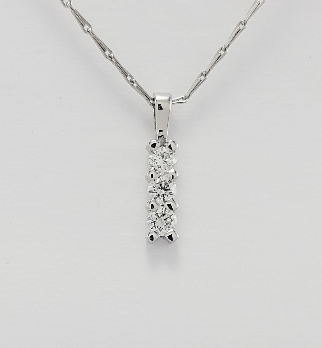 18ct White Gold Diamond set Trilogy Pendant on Chain-0