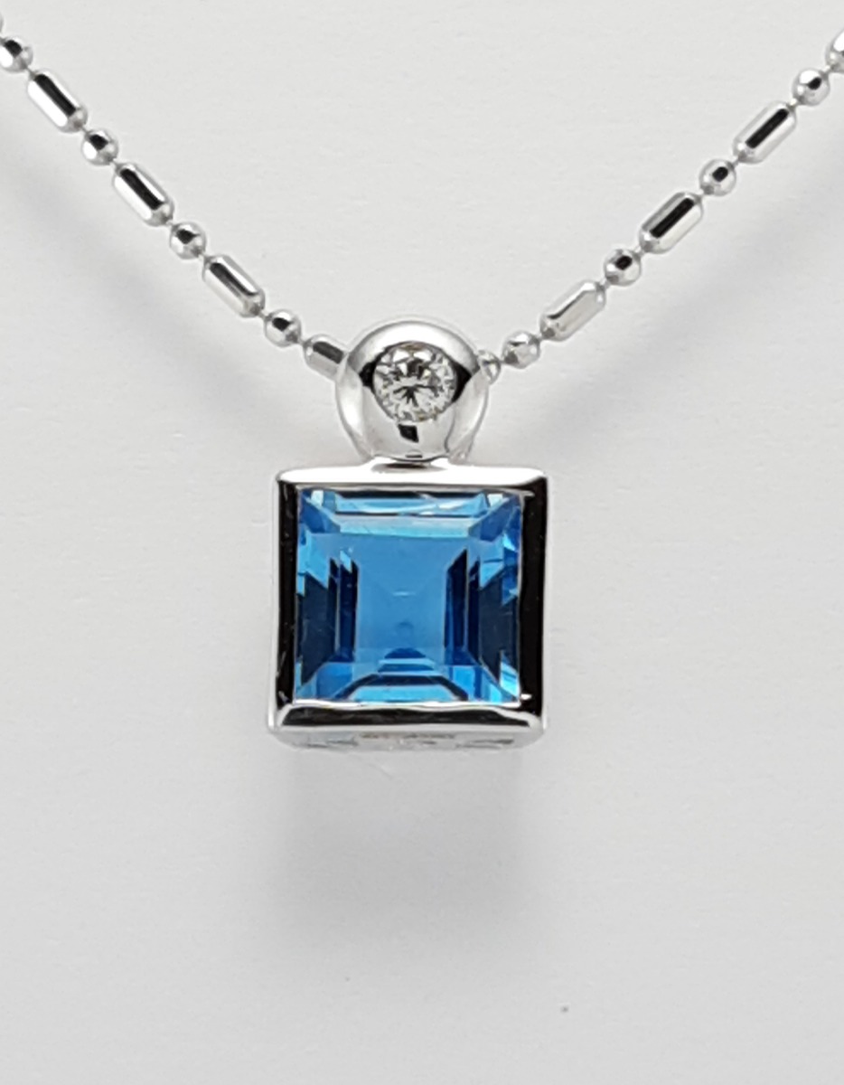 18ct White Gold Blue Topaz and Diamond Pendant on Chain-0