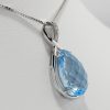 9ct White gold Blue Topaz and Diamond Pendant and chain-1501