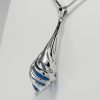 9ct White Gold Blue Topaz bomber style pendant and Chain-1544